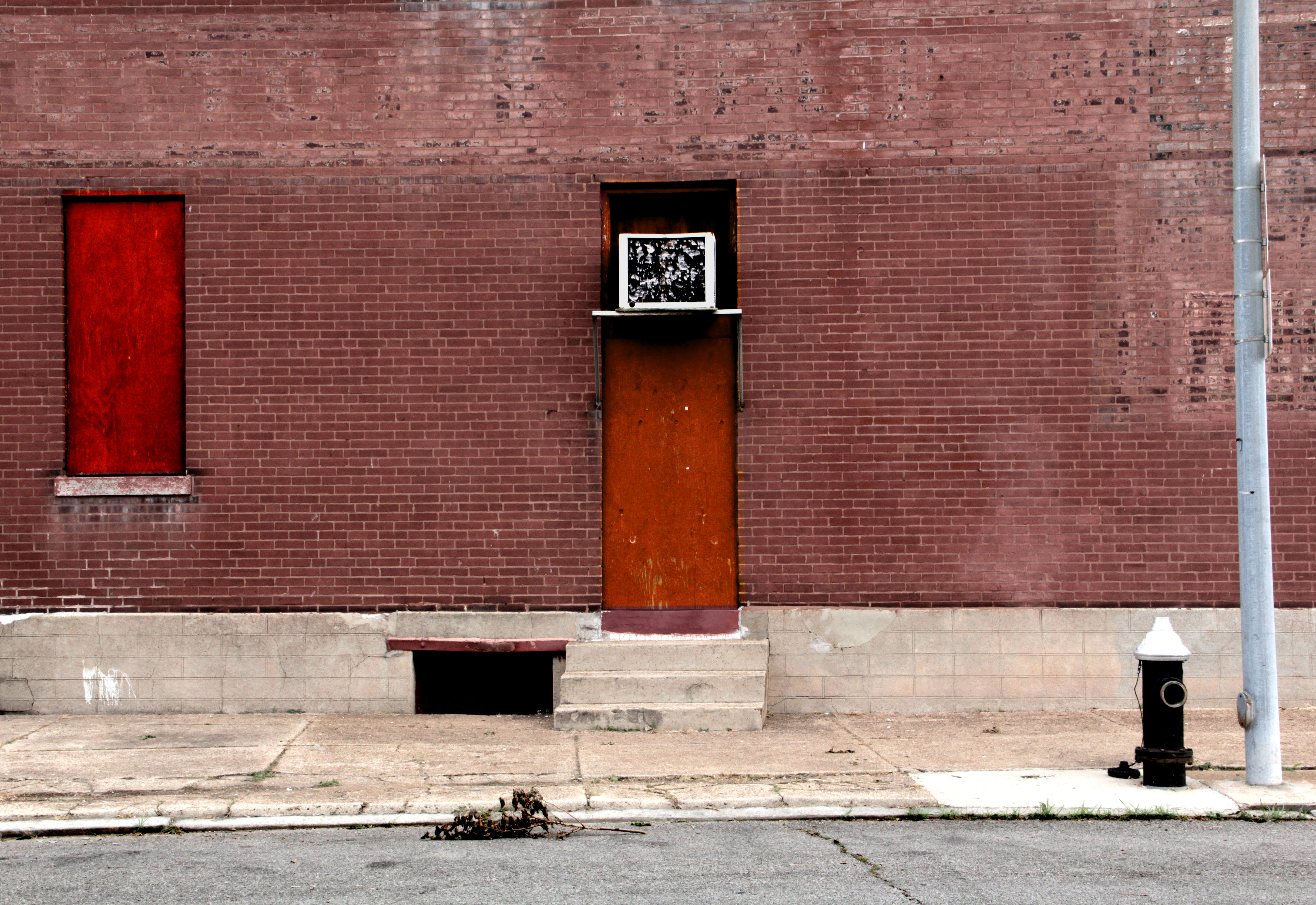 brick-wall-red-doors-june-2011.jpg